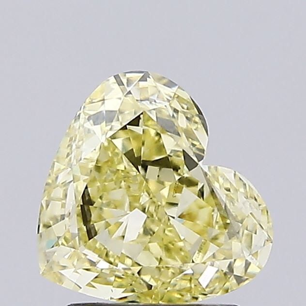 Loose Diamond - HEART 1.9ct Fancy Yellow VS2: Loose Diamond - HEART 1.9ct Fancy Yellow VS2 Source: This is a real non-mined Diamond that has been grown in a lab Shape: HEART Carats: 1.9 Color: Fancy Yellow Certification: IGI Video: