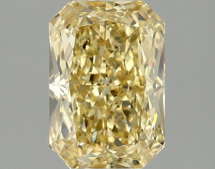 Loose Diamond - RADIANT 1.98ct Fancy Vivid Yellow VS1: Loose Diamond - RADIANT 1.98ct Fancy Vivid Yellow VS1 Source: This is a real non-mined Diamond that has been grown in a lab Shape: RADIANT Carats: 1.98 Color: Fancy Vivid Yellow Certification: IGI Vid
