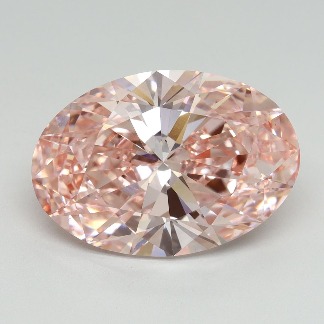 Loose Diamond - OVAL 8.78ct Fancy Vivid Pink VS1: Loose Diamond - OVAL 8.78ct Fancy Vivid Pink VS1 Source: This is a real non-mined Diamond that has been grown in a lab Shape: OVAL Carats: 8.78 Color: Fancy Vivid Pink Certification: IGI Video: