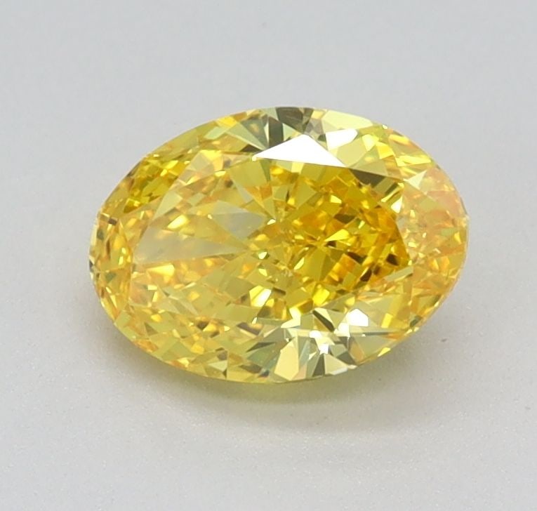 Loose Diamond - OVAL 0.71ct Fancy Vivid Yellow VS1: Loose Diamond - OVAL 0.71ct Fancy Vivid Yellow VS1 Source: This is a real non-mined Diamond that has been grown in a lab Shape: OVAL Carats: 0.71 Color: Fancy Vivid Yellow Certification: IGI Video: