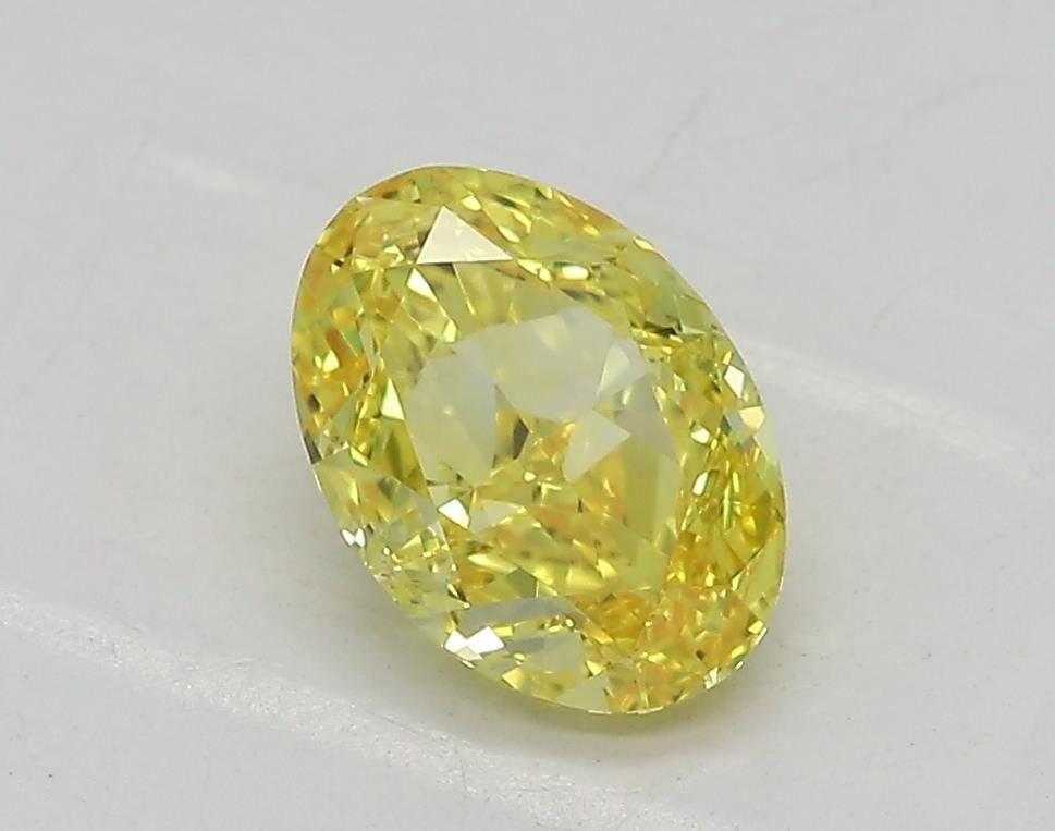Loose Diamond - OVAL 1.01ct Fancy Vivid Yellow VS1: Loose Diamond - OVAL 1.01ct Fancy Vivid Yellow VS1 Source: This is a real non-mined Diamond that has been grown in a lab Shape: OVAL Carats: 1.01 Color: Fancy Vivid Yellow Certification: IGI Video: