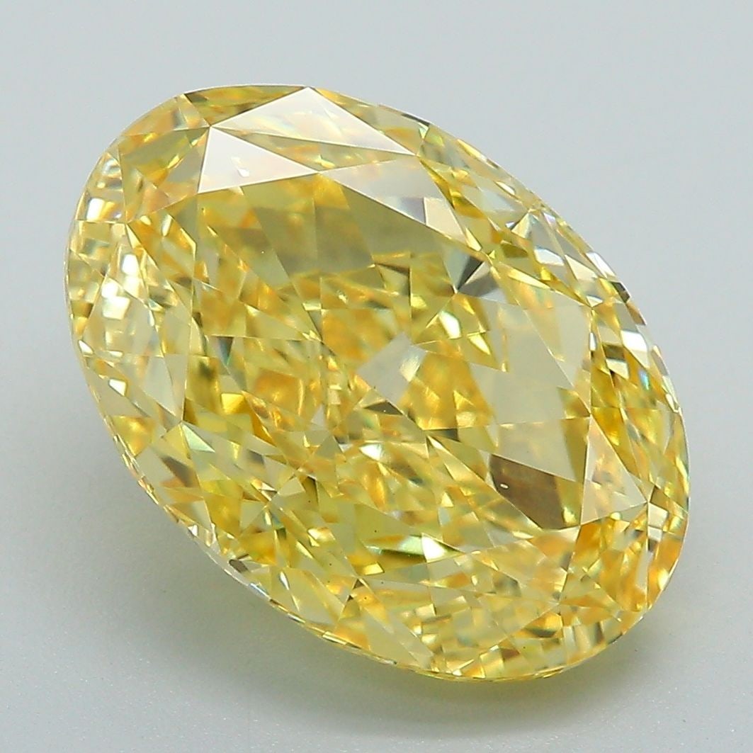 Loose Diamond - OVAL 6.54ct Fancy Vivid Yellow VS1: Loose Diamond - OVAL 6.54ct Fancy Vivid Yellow VS1 Source: This is a real non-mined Diamond that has been grown in a lab Shape: OVAL Carats: 6.54 Color: Fancy Vivid Yellow Certification: IGI Video:
