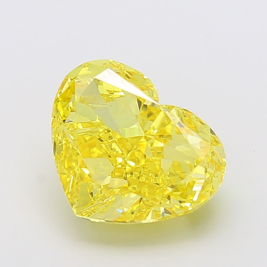 Loose Diamond - HEART 9.01ct Fancy Vivid Yellow VS2: Loose Diamond - HEART 9.01ct Fancy Vivid Yellow VS2 Source: This is a real non-mined Diamond that has been grown in a lab Shape: HEART Carats: 9.01 Color: Fancy Vivid Yellow Certification: IGI Video: