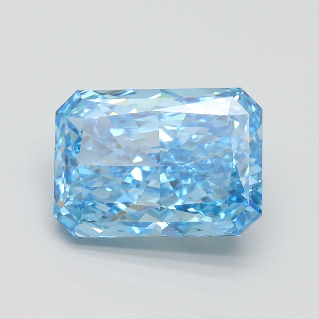 Loose Diamond - RADIANT 4.29ct Fancy Vivid Blue SI2: Loose Diamond - RADIANT 4.29ct Fancy Vivid Blue SI2 Source: This is a real non-mined Diamond that has been grown in a lab Shape: RADIANT Carats: 4.29 Color: Fancy Vivid Blue Certification: IGI Video:
