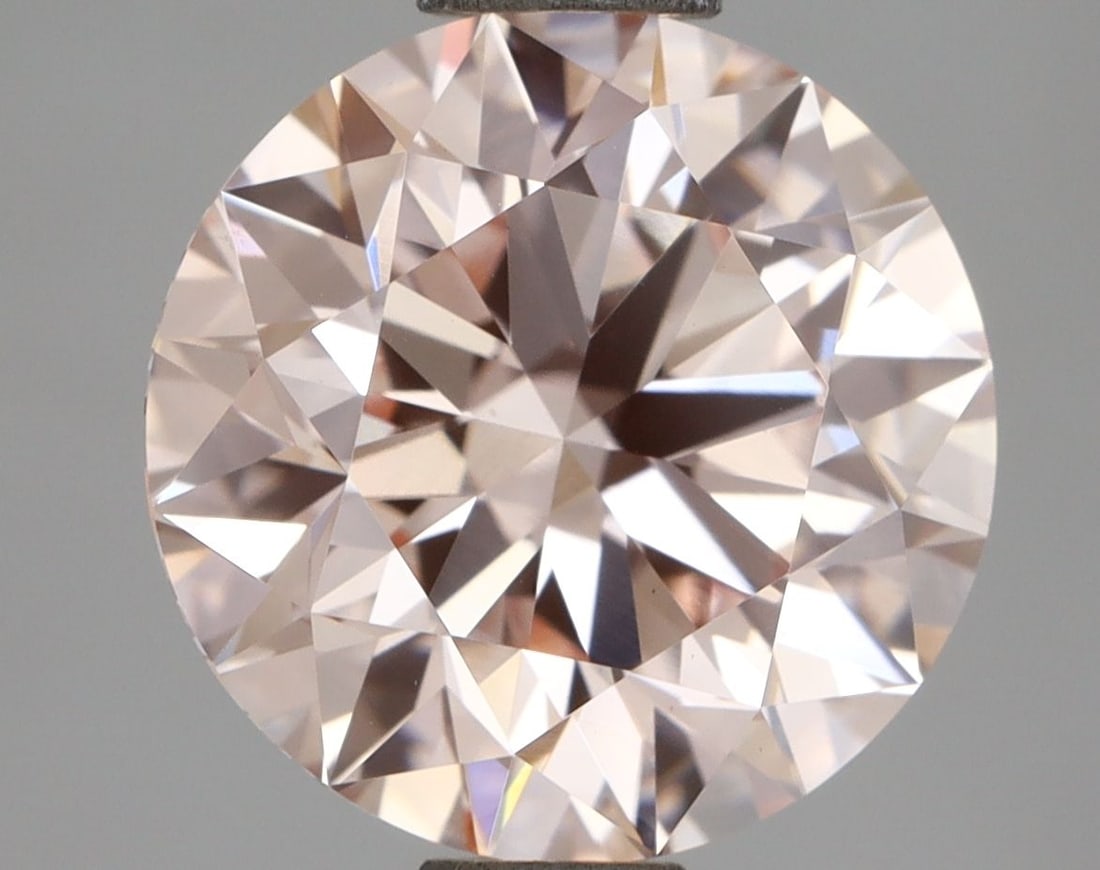 Ideal Loose Diamond - ROUND 2.5ct Fancy Pink VS1: Ideal Loose Diamond - ROUND 2.5ct Fancy Pink VS1 Source: This is a real non-mined Diamond that has been grown in a lab Shape: ROUND Carats: 2.5 Color: Fancy Pink Certification: IGI Video: