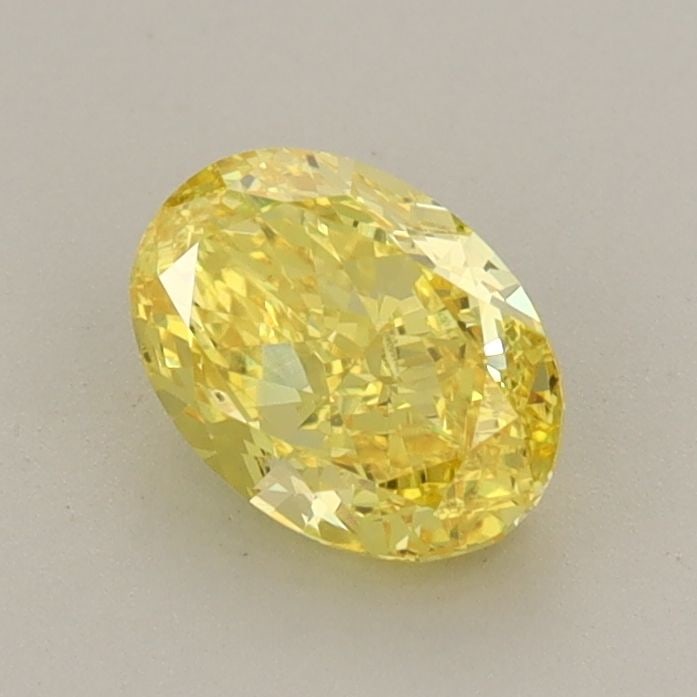Loose Diamond - OVAL 0.8ct Fancy Vivid Yellow VS1: Loose Diamond - OVAL 0.8ct Fancy Vivid Yellow VS1 Source: This is a real non-mined Diamond that has been grown in a lab Shape: OVAL Carats: 0.8 Color: Fancy Vivid Yellow Certification: IGI Video: