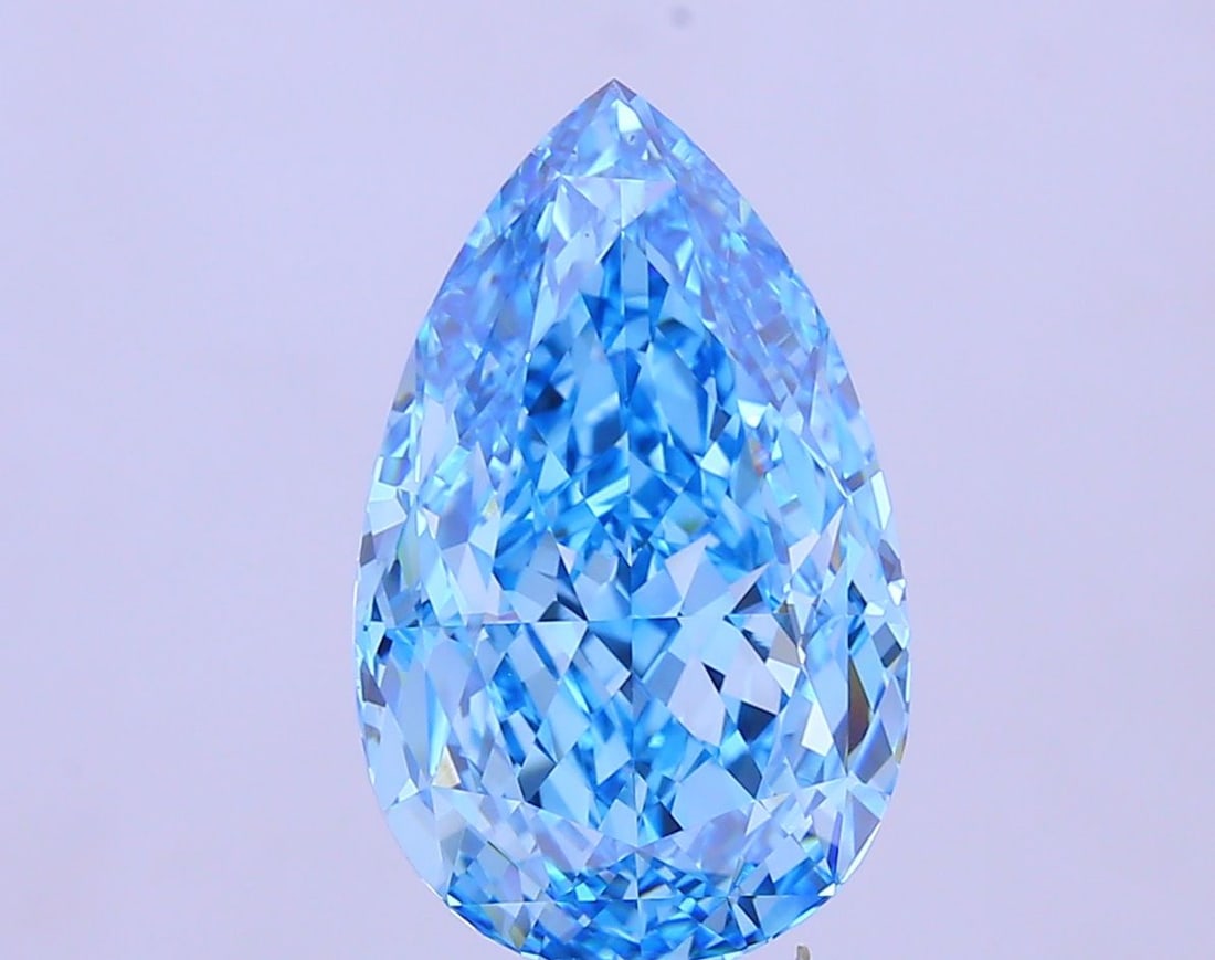 Loose Diamond - PEAR 15.12ct Fancy Vivid Blue VS1: Loose Diamond - PEAR 15.12ct Fancy Vivid Blue VS1 Source: This is a real non-mined Diamond that has been grown in a lab Shape: PEAR Carats: 15.12 Color: Fancy Vivid Blue Certification: IGI Video: