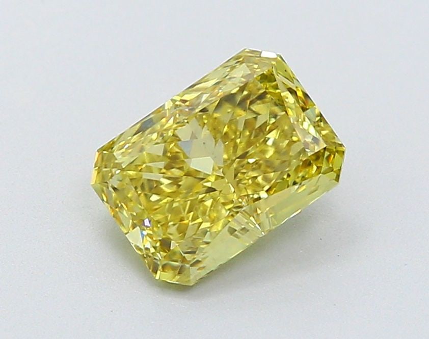 Loose Diamond - RADIANT 1.36ct Fancy Vivid Yellow VS1: Loose Diamond - RADIANT 1.36ct Fancy Vivid Yellow VS1 Source: This is a real non-mined Diamond that has been grown in a lab Shape: RADIANT Carats: 1.36 Color: Fancy Vivid Yellow Certification: IGI Vid
