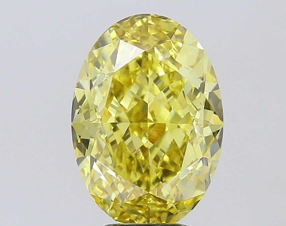 Loose Diamond - OVAL 6.99ct Fancy Intense Yellow VS1: Loose Diamond - OVAL 6.99ct Fancy Intense Yellow VS1 Source: This is a real non-mined Diamond that has been grown in a lab Shape: OVAL Carats: 6.99 Color: Fancy Intense Yellow Certification: IGI Video