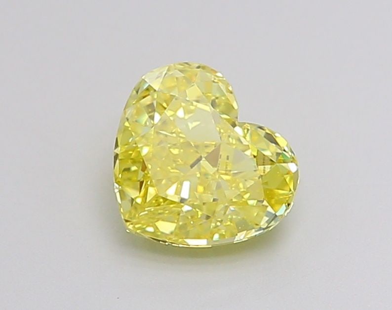 Loose Diamond - HEART 1.25ct Fancy Vivid Yellow VVS1: Loose Diamond - HEART 1.25ct Fancy Vivid Yellow VVS1 Source: This is a real non-mined Diamond that has been grown in a lab Shape: HEART Carats: 1.25 Color: Fancy Vivid Yellow Certification: IGI Video: