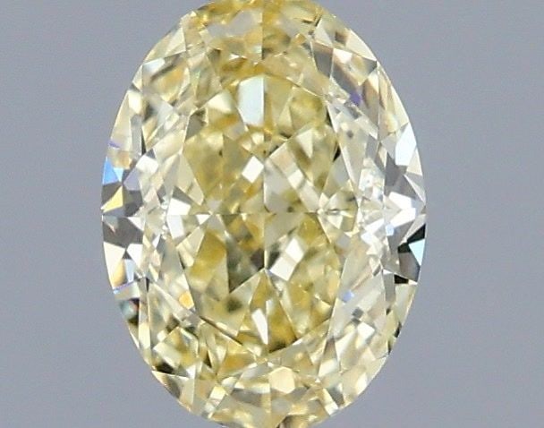 Loose Diamond - OVAL 1.02ct Fancy Intense Yellow VVS2: Loose Diamond - OVAL 1.02ct Fancy Intense Yellow VVS2 Source: This is a real non-mined Diamond that has been grown in a lab Shape: OVAL Carats: 1.02 Color: Fancy Intense Yellow Certification: IGI Vide