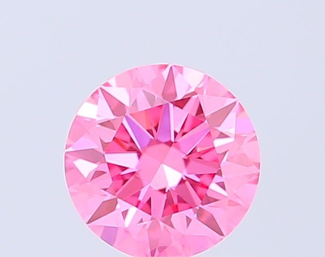 Ideal Loose Diamond - ROUND 0.52ct Fancy Vivid Pink VS1: Ideal Loose Diamond - ROUND 0.52ct Fancy Vivid Pink VS1 Source: This is a real non-mined Diamond that has been grown in a lab Shape: ROUND Carats: 0.52 Color: Fancy Vivid Pink Certification: IGI Video