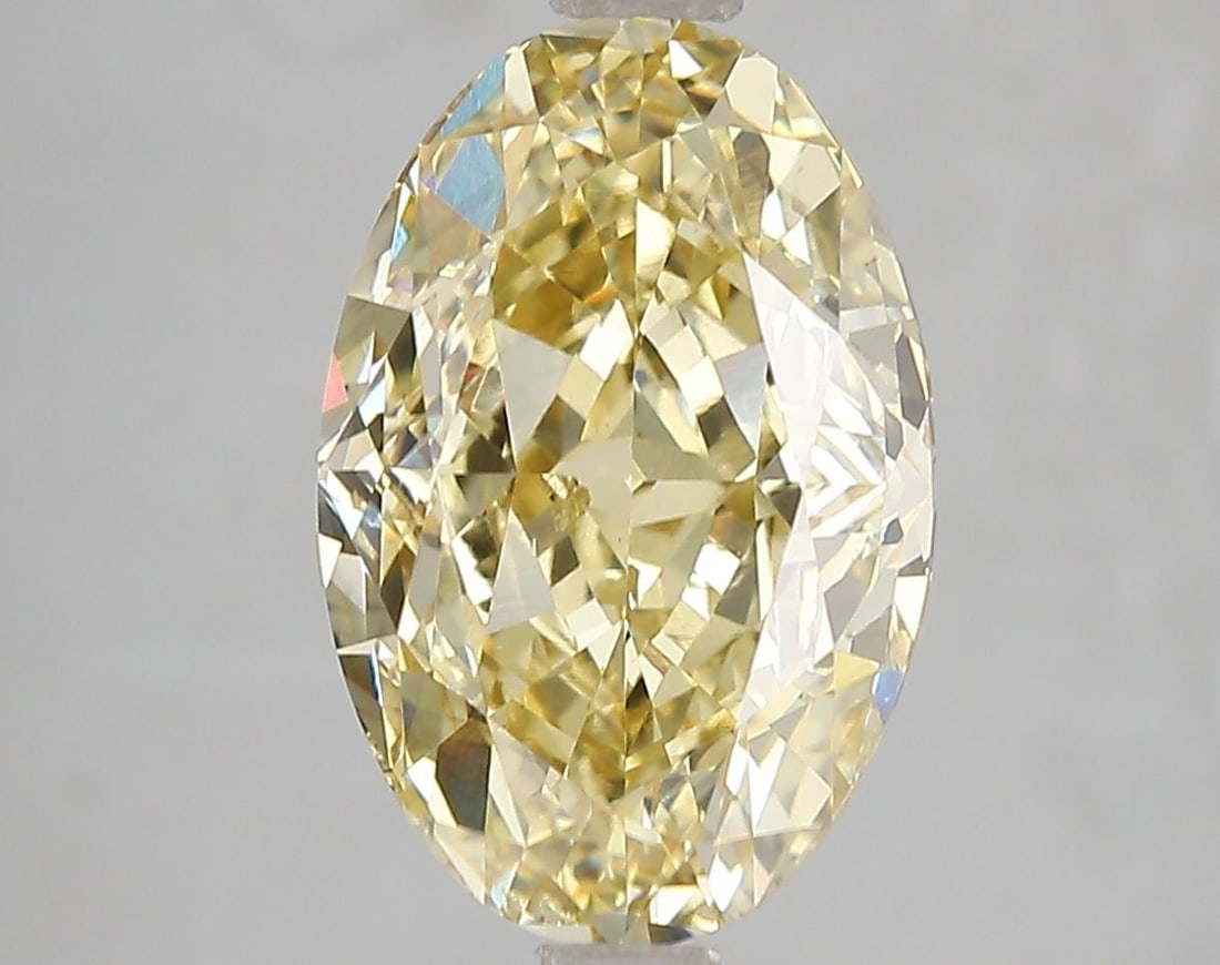 Loose Diamond - OVAL 5.02ct Fancy Intense Yellow VS2: Loose Diamond - OVAL 5.02ct Fancy Intense Yellow VS2 Source: This is a real non-mined Diamond that has been grown in a lab Shape: OVAL Carats: 5.02 Color: Fancy Intense Yellow Certification: IGI Video