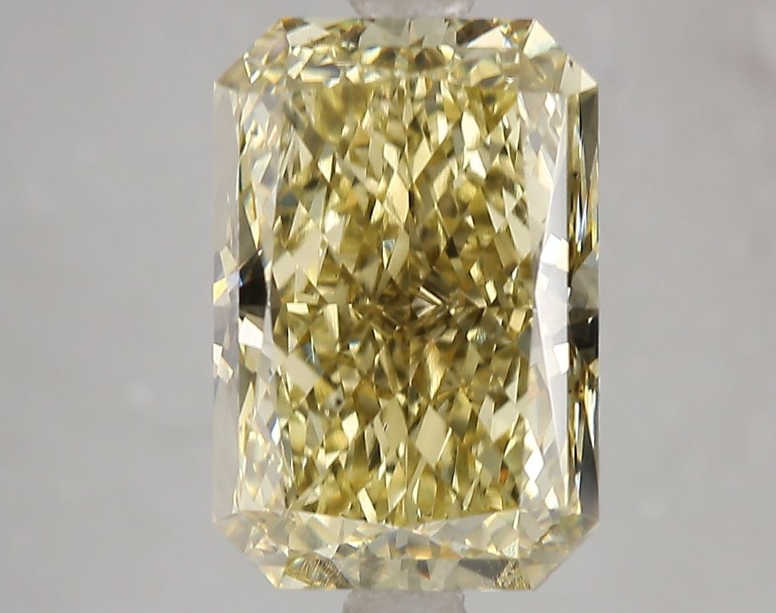 Loose Diamond - RADIANT 5.02ct Fancy Intense Yellow VS2: Loose Diamond - RADIANT 5.02ct Fancy Intense Yellow VS2 Source: This is a real non-mined Diamond that has been grown in a lab Shape: RADIANT Carats: 5.02 Color: Fancy Intense Yellow Certification: IGI