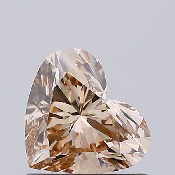 Loose Diamond - HEART 0.68ct Fancy Light Brown VVS2: Loose Diamond - HEART 0.68ct Fancy Light Brown VVS2 Source: This is a real non-mined Diamond that has been grown in a lab Shape: HEART Carats: 0.68 Color: Fancy Light Brown Certification: IGI Video: