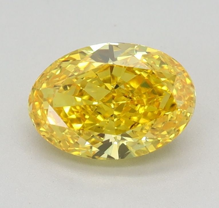 Loose Diamond - OVAL 0.83ct Fancy Vivid Yellow VS1: Loose Diamond - OVAL 0.83ct Fancy Vivid Yellow VS1 Source: This is a real non-mined Diamond that has been grown in a lab Shape: OVAL Carats: 0.83 Color: Fancy Vivid Yellow Certification: IGI Video: