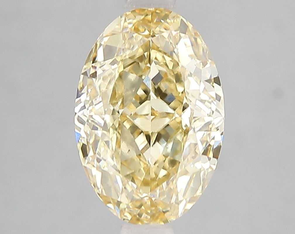 Loose Diamond - OVAL 3.05ct Fancy Intense Yellow VS2: Loose Diamond - OVAL 3.05ct Fancy Intense Yellow VS2 Source: This is a real non-mined Diamond that has been grown in a lab Shape: OVAL Carats: 3.05 Color: Fancy Intense Yellow Certification: IGI Video