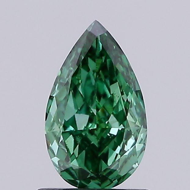 Loose Diamond - PEAR 0.91ct Fancy Vivid Green VS1: Loose Diamond - PEAR 0.91ct Fancy Vivid Green VS1 Source: This is a real non-mined Diamond that has been grown in a lab Shape: PEAR Carats: 0.91 Color: Fancy Vivid Green Certification: IGI Video: