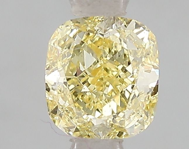 Loose Diamond - CUSHION MODIFIED 1.08ct Fancy Vivid Yellow VS2: Loose Diamond - CUSHION MODIFIED 1.08ct Fancy Vivid Yellow VS2 Source: This is a real non-mined Diamond that has been grown in a lab Shape: CUSHION MODIFIED Carats: 1.08 Color: Fancy Vivid Yellow Cert