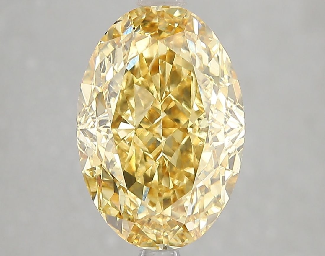 Loose Diamond - OVAL 5.03ct Fancy Vivid Yellow VS1: Loose Diamond - OVAL 5.03ct Fancy Vivid Yellow VS1 Source: This is a real non-mined Diamond that has been grown in a lab Shape: OVAL Carats: 5.03 Color: Fancy Vivid Yellow Certification: IGI Video: