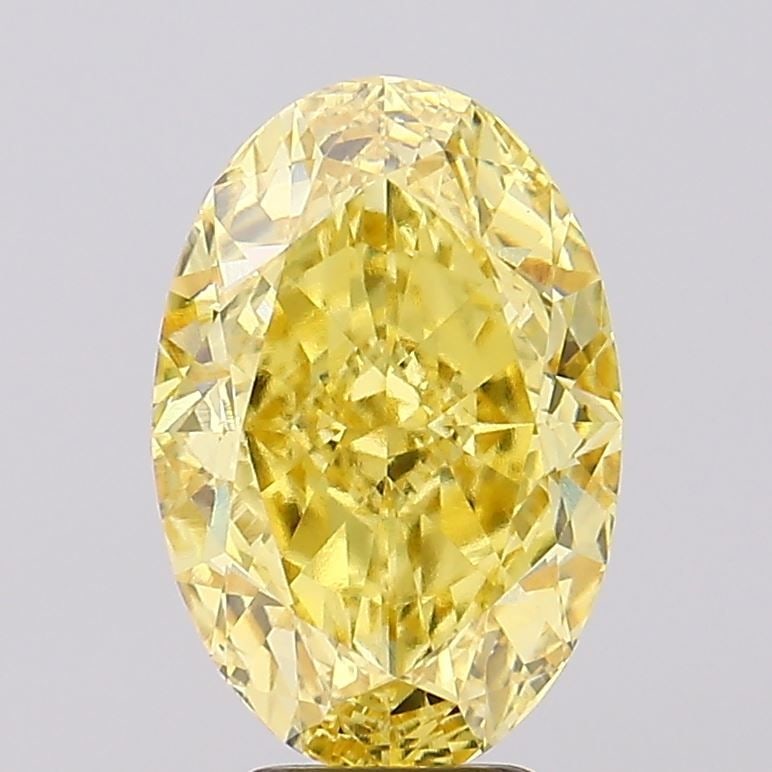 Loose Diamond - OVAL 6.48ct Fancy Vivid Yellow VVS2: Loose Diamond - OVAL 6.48ct Fancy Vivid Yellow VVS2 Source: This is a real non-mined Diamond that has been grown in a lab Shape: OVAL Carats: 6.48 Color: Fancy Vivid Yellow Certification: IGI Video: