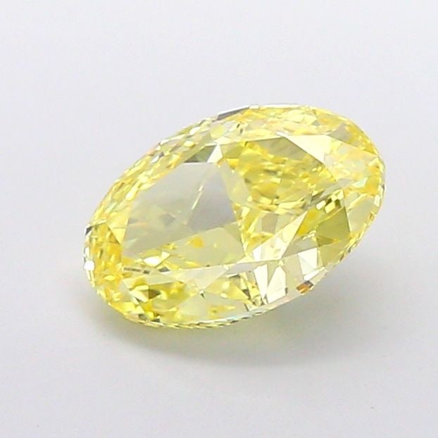 Loose Diamond - OVAL 2.2ct Fancy Vivid Yellow VS2: Loose Diamond - OVAL 2.2ct Fancy Vivid Yellow VS2 Source: This is a real non-mined Diamond that has been grown in a lab Shape: OVAL Carats: 2.2 Color: Fancy Vivid Yellow Certification: IGI The Diamond