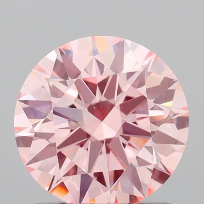 Ideal Loose Diamond - ROUND 1.03ct Fancy Intense Pink VVS2: Ideal Loose Diamond - ROUND 1.03ct Fancy Intense Pink VVS2 Source: This is a real non-mined Diamond that has been grown in a lab Shape: ROUND Carats: 1.03 Color: Fancy Intense Pink Certification: IGI 