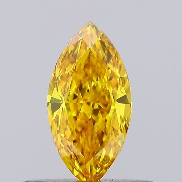 Loose Diamond - MARQUISE 0.41ct Fancy Vivid Yellow VS2: Loose Diamond - MARQUISE 0.41ct Fancy Vivid Yellow VS2 Source: This is a real non-mined Diamond that has been grown in a lab Shape: MARQUISE Carats: 0.41 Color: Fancy Vivid Yellow Certification: IGI V
