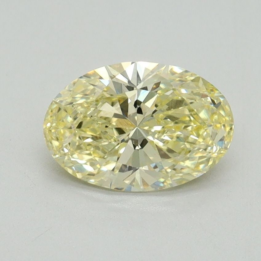 Loose Diamond - OVAL 1.02ct Fancy Intense Yellow VS2: Loose Diamond - OVAL 1.02ct Fancy Intense Yellow VS2 Source: This is a real non-mined Diamond that has been grown in a lab Shape: OVAL Carats: 1.02 Color: Fancy Intense Yellow Certification: IGI Video