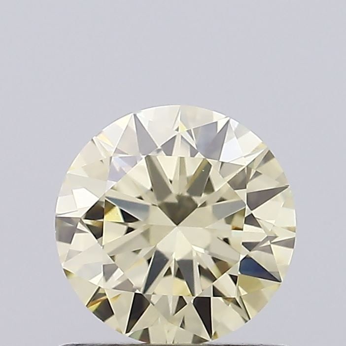 Loose Diamond - ROUND 0.77ct Y-Z VVS2: Loose Diamond - ROUND 0.77ct Y-Z VVS2 Source: This is a real non-mined Diamond that has been grown in a lab Shape: ROUND Carats: 0.77 Color: Y-Z Certification: IGI Video: