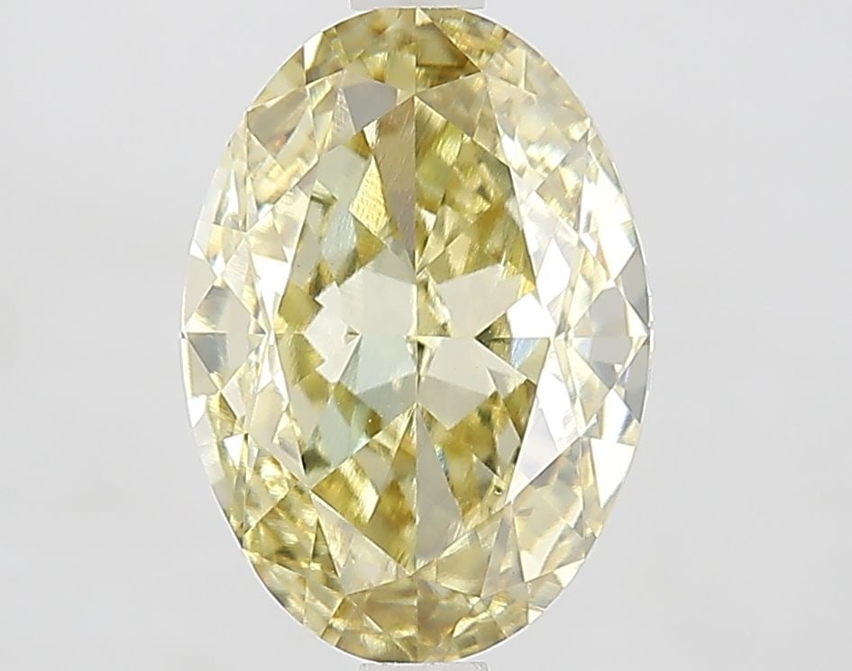 Loose Diamond - OVAL 3.35ct Fancy Yellow VVS2: Loose Diamond - OVAL 3.35ct Fancy Yellow VVS2 Source: This is a real non-mined Diamond that has been grown in a lab Shape: OVAL Carats: 3.35 Color: Fancy Yellow Certification: IGI Video:
