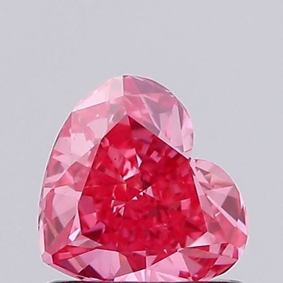 Loose Diamond - HEART 0.59ct Fancy Vivid Pink VS1: Loose Diamond - HEART 0.59ct Fancy Vivid Pink VS1 Source: This is a real non-mined Diamond that has been grown in a lab Shape: HEART Carats: 0.59 Color: Fancy Vivid Pink Certification: IGI Video: