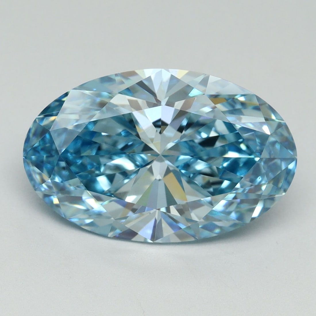 Loose Diamond - OVAL 6.1ct Fancy Vivid Blue VS1: Loose Diamond - OVAL 6.1ct Fancy Vivid Blue VS1 Source: This is a real non-mined Diamond that has been grown in a lab Shape: OVAL Carats: 6.1 Color: Fancy Vivid Blue Certification: IGI Video:
