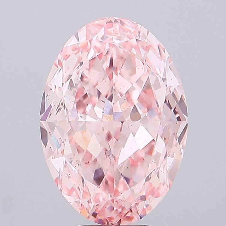 Loose Diamond - OVAL 10.11ct Fancy Vivid Pink SI1: Loose Diamond - OVAL 10.11ct Fancy Vivid Pink SI1 Source: This is a real non-mined Diamond that has been grown in a lab Shape: OVAL Carats: 10.11 Color: Fancy Vivid Pink Certification: IGI Video: