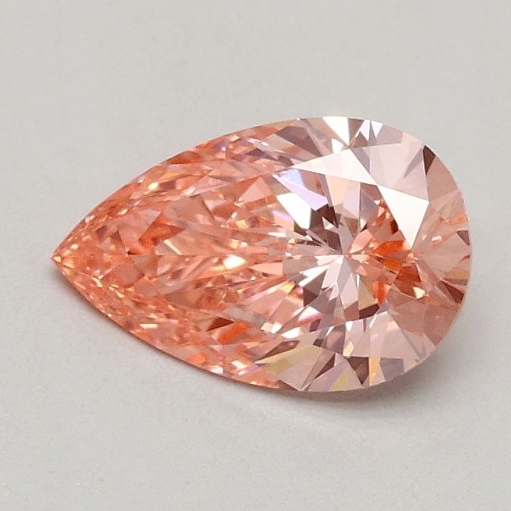 Loose Diamond - PEAR 0.61ct Fancy Vivid Pink VVS2: Loose Diamond - PEAR 0.61ct Fancy Vivid Pink VVS2 Source: This is a real non-mined Diamond that has been grown in a lab Shape: PEAR Carats: 0.61 Color: Fancy Vivid Pink Certification: IGI Video:
