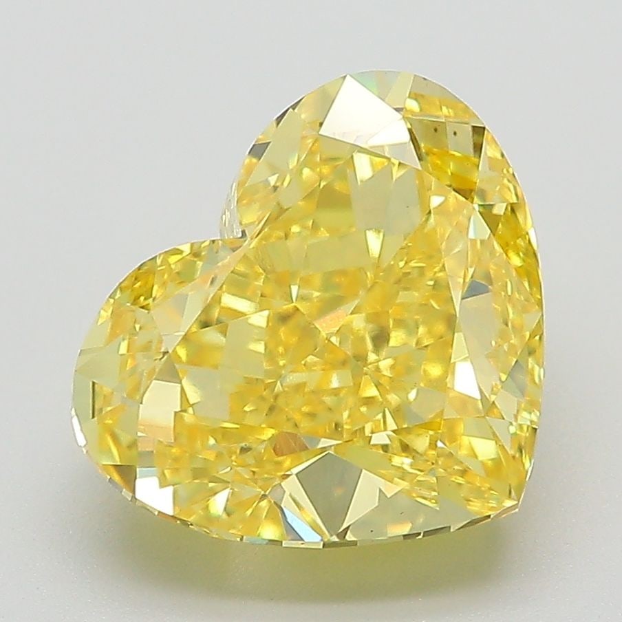 Loose Diamond - HEART 4.57ct Fancy Vivid Yellow VS1: Loose Diamond - HEART 4.57ct Fancy Vivid Yellow VS1 Source: This is a real non-mined Diamond that has been grown in a lab Shape: HEART Carats: 4.57 Color: Fancy Vivid Yellow Certification: IGI The Dia