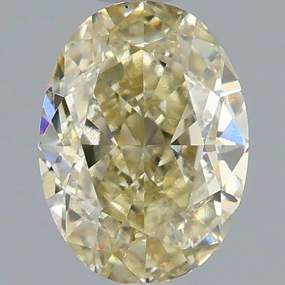 Loose Diamond - OVAL 1.09ct Fancy Light Yellow VS2: Loose Diamond - OVAL 1.09ct Fancy Light Yellow VS2 Source: This is a real non-mined Diamond that has been grown in a lab Shape: OVAL Carats: 1.09 Color: Fancy Light Yellow Certification: IGI Video: