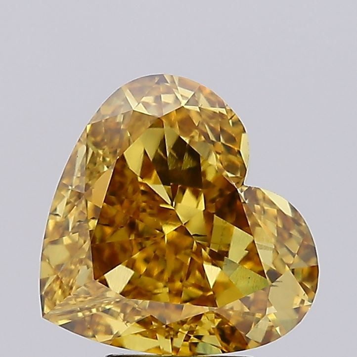 Loose Diamond - HEART 7.02ct Fancy Vivid Brownish Yellow VS2: Loose Diamond - HEART 7.02ct Fancy Vivid Brownish Yellow VS2 Source: This is a real non-mined Diamond that has been grown in a lab Shape: HEART Carats: 7.02 Color: Fancy Vivid Brownish Yellow Certific