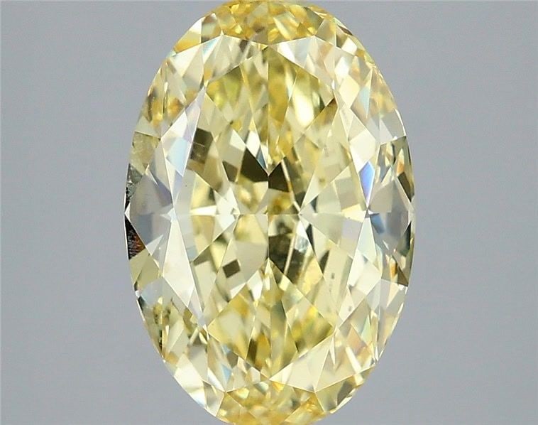 Loose Diamond - OVAL 4.29ct Fancy Intense Yellow VS1: Loose Diamond - OVAL 4.29ct Fancy Intense Yellow VS1 Source: This is a real non-mined Diamond that has been grown in a lab Shape: OVAL Carats: 4.29 Color: Fancy Intense Yellow Certification: IGI Video