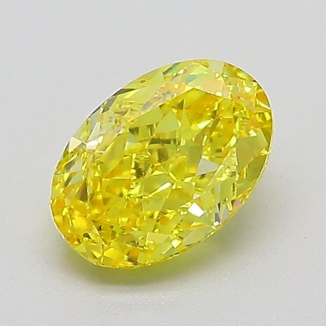 Loose Diamond - OVAL 1.04ct Fancy Vivid Yellow VVS2: Loose Diamond - OVAL 1.04ct Fancy Vivid Yellow VVS2 Source: This is a real non-mined Diamond that has been grown in a lab Shape: OVAL Carats: 1.04 Color: Fancy Vivid Yellow Certification: IGI Video: