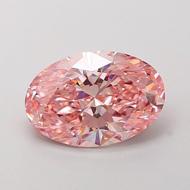 Loose Diamond - OVAL 2.2ct Fancy Vivid Pink VS2: Loose Diamond - OVAL 2.2ct Fancy Vivid Pink VS2 Source: This is a real non-mined Diamond that has been grown in a lab Shape: OVAL Carats: 2.2 Color: Fancy Vivid Pink Certification: IGI Video: