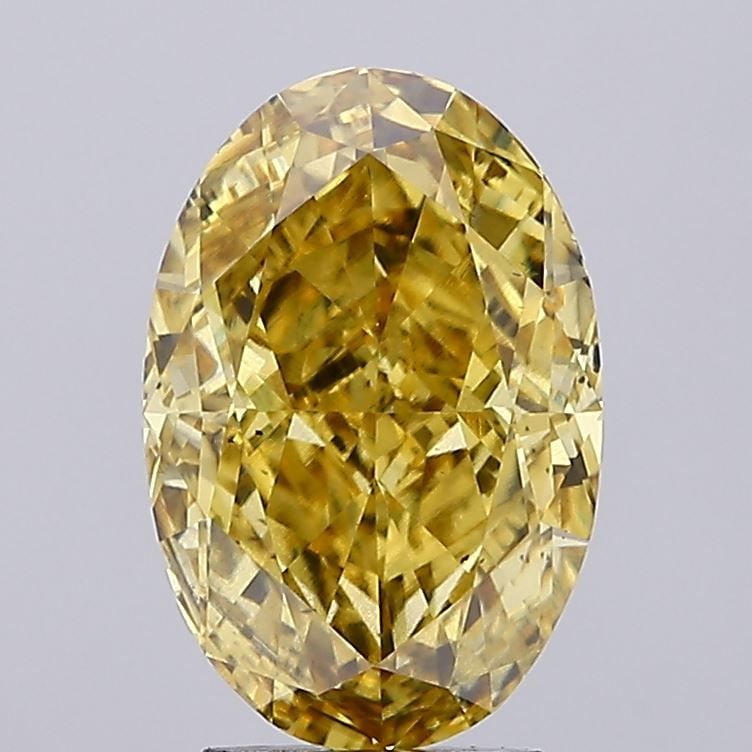 Loose Diamond - OVAL 4.01ct Fancy Vivid Yellow SI1: Loose Diamond - OVAL 4.01ct Fancy Vivid Yellow SI1 Source: This is a real non-mined Diamond that has been grown in a lab Shape: OVAL Carats: 4.01 Color: Fancy Vivid Yellow Certification: IGI Video: