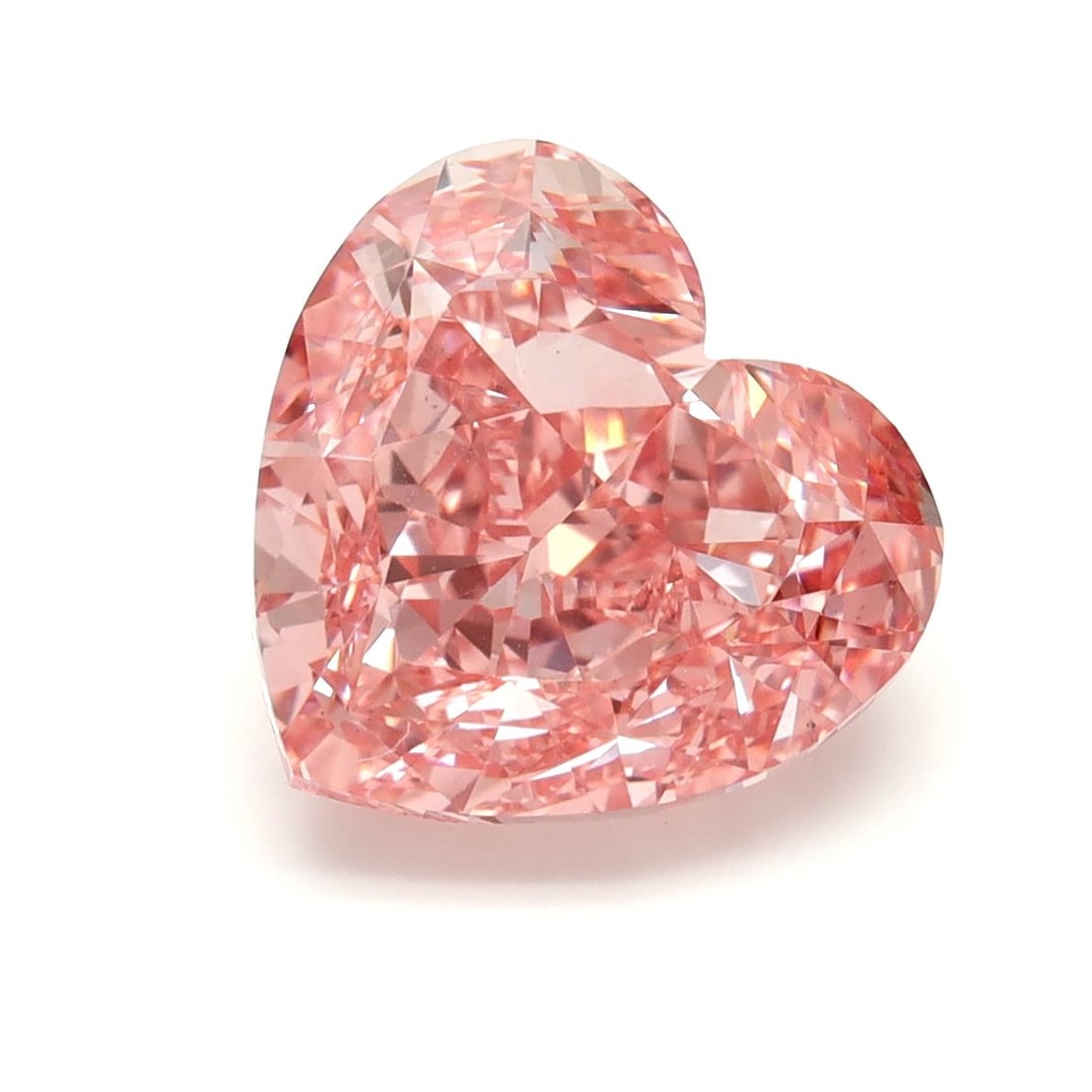 Loose Diamond - HEART 4.56ct Fancy Vivid Pink VS1: Loose Diamond - HEART 4.56ct Fancy Vivid Pink VS1 Source: This is a real non-mined Diamond that has been grown in a lab Shape: HEART Carats: 4.56 Color: Fancy Vivid Pink Certification: IGI Video: