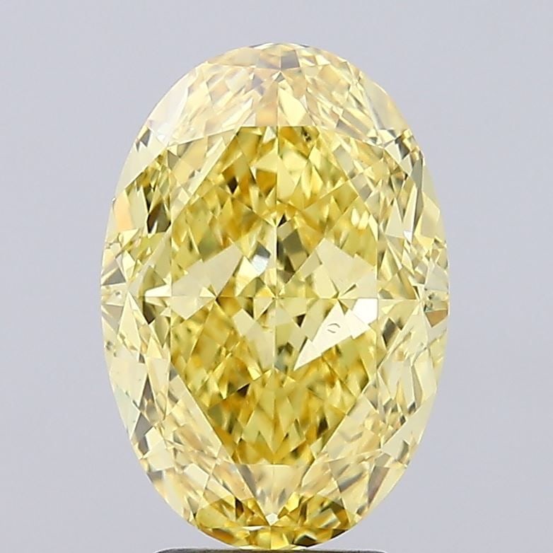Loose Diamond - OVAL 4.56ct Fancy Vivid Yellow VS1: Loose Diamond - OVAL 4.56ct Fancy Vivid Yellow VS1 Source: This is a real non-mined Diamond that has been grown in a lab Shape: OVAL Carats: 4.56 Color: Fancy Vivid Yellow Certification: IGI Video: