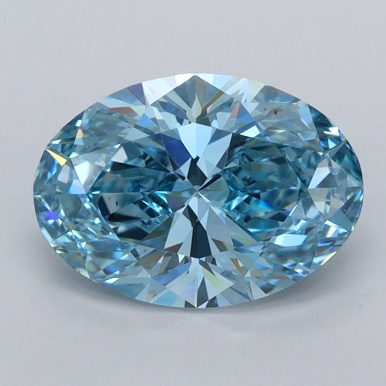 Loose Diamond - OVAL 1.55ct Fancy Vivid Blue VVS2: Loose Diamond - OVAL 1.55ct Fancy Vivid Blue VVS2 Source: This is a real non-mined Diamond that has been grown in a lab Shape: OVAL Carats: 1.55 Color: Fancy Vivid Blue Certification: IGI Video: