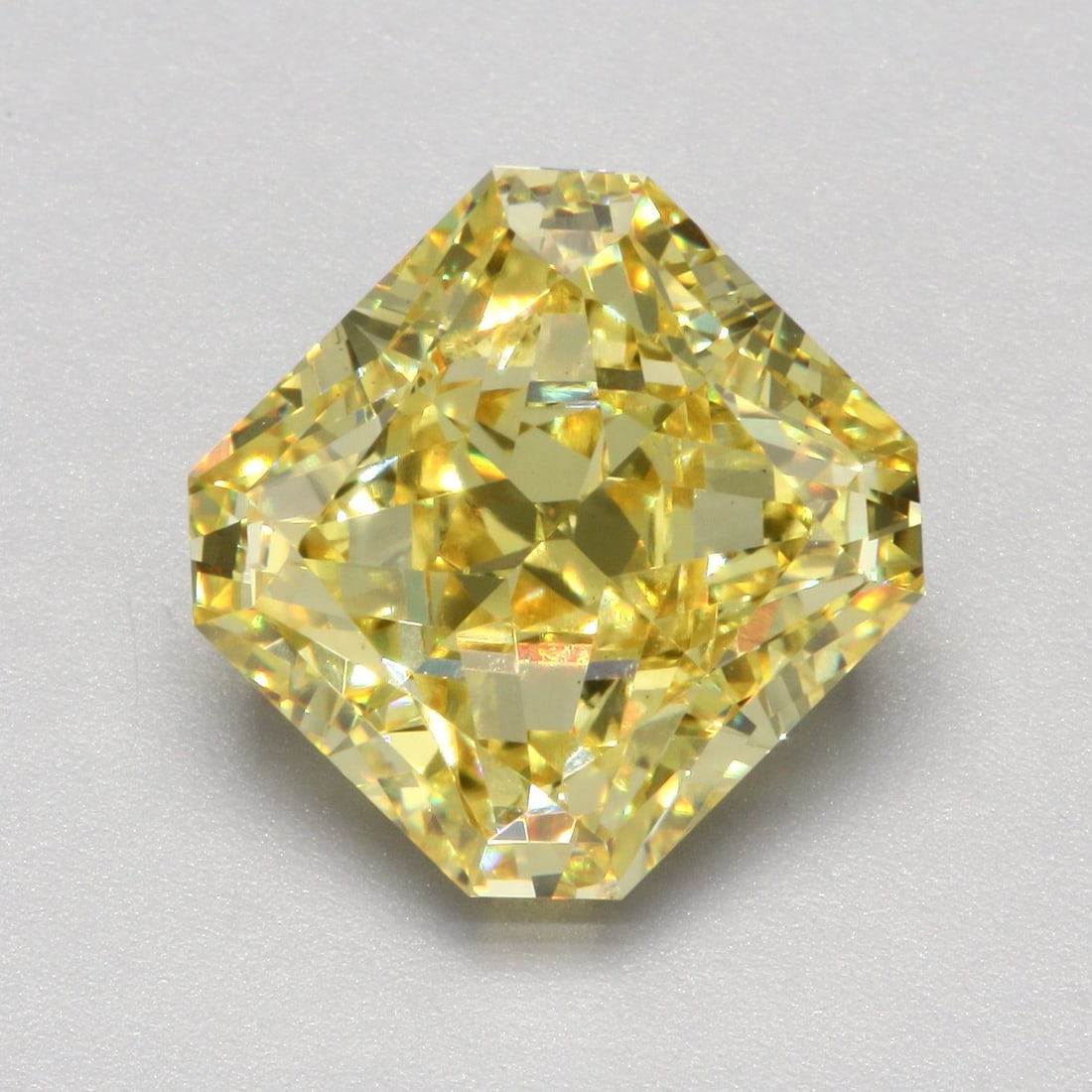 Loose Diamond - SQUARE RADIANT 6.51ct Fancy Vivid Yellow VS2: Loose Diamond - SQUARE RADIANT 6.51ct Fancy Vivid Yellow VS2 Source: This is a real non-mined Diamond that has been grown in a lab Shape: SQUARE RADIANT Carats: 6.51 Color: Fancy Vivid Yellow Certific