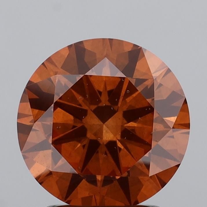 Loose Diamond - ROUND 1.99ct Fancy Intense Brownish Orange SI1: Loose Diamond - ROUND 1.99ct Fancy Intense Brownish Orange SI1 Source: This is a real non-mined Diamond that has been grown in a lab Shape: ROUND Carats: 1.99 Color: Fancy Intense Brownish Orange Cert