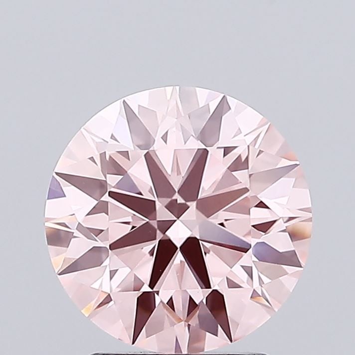 Ideal Loose Diamond - ROUND 2.56ct Fancy Vivid Pink VVS2: Ideal Loose Diamond - ROUND 2.56ct Fancy Vivid Pink VVS2 Source: This is a real non-mined Diamond that has been grown in a lab Shape: ROUND Carats: 2.56 Color: Fancy Vivid Pink Certification: IGI Vide