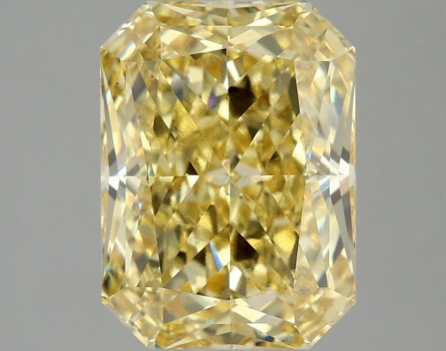 Loose Diamond - RADIANT 4.1ct Fancy Vivid Yellow VS1: Loose Diamond - RADIANT 4.1ct Fancy Vivid Yellow VS1 Source: This is a real non-mined Diamond that has been grown in a lab Shape: RADIANT Carats: 4.1 Color: Fancy Vivid Yellow Certification: IGI Video