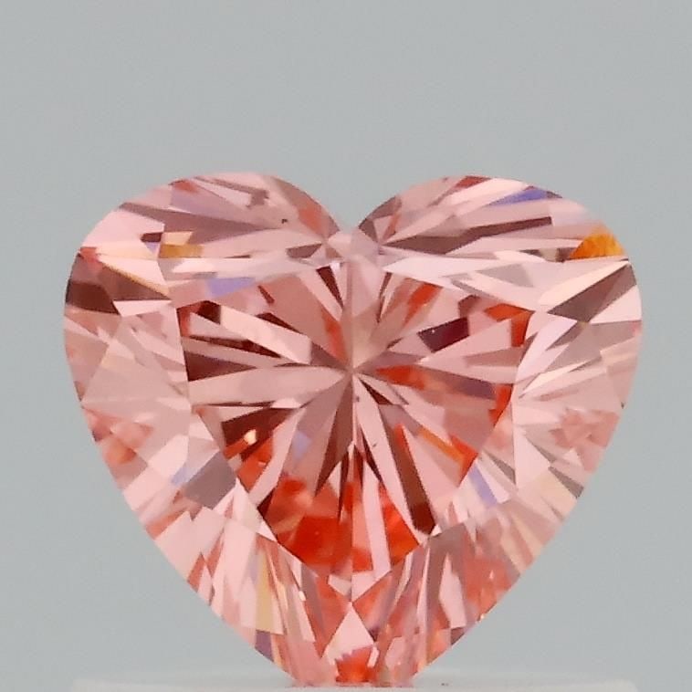 Loose Diamond - HEART 0.7ct Fancy Vivid Pink VS1: Loose Diamond - HEART 0.7ct Fancy Vivid Pink VS1 Source: This is a real non-mined Diamond that has been grown in a lab Shape: HEART Carats: 0.7 Color: Fancy Vivid Pink Certification: IGI Video: